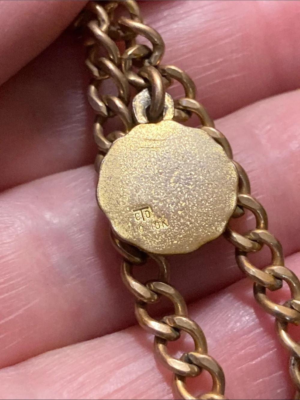 Gold Chain Bracelet marked 1/20 12K with Two 1/10 10K Medallion Charms